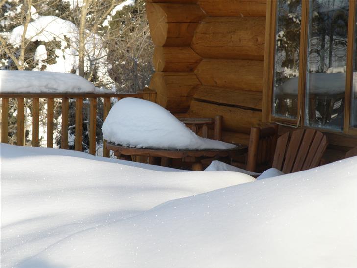 on the back porch of the Inn at the Lake.