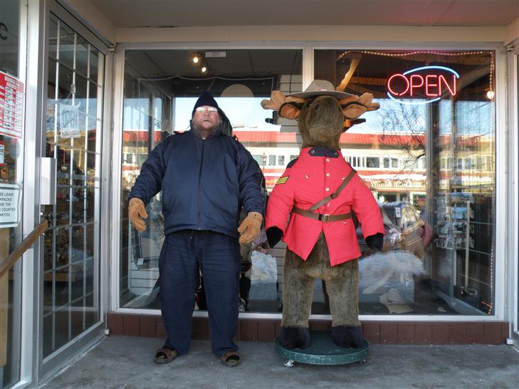 standing guard in front of a store in downtown Whitehorse. We tried to chat, but it was just too cold.