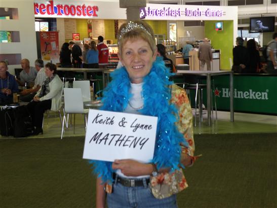 at the Brisbane airport, complete with tiara and boa. What a wonderful hostess she was.