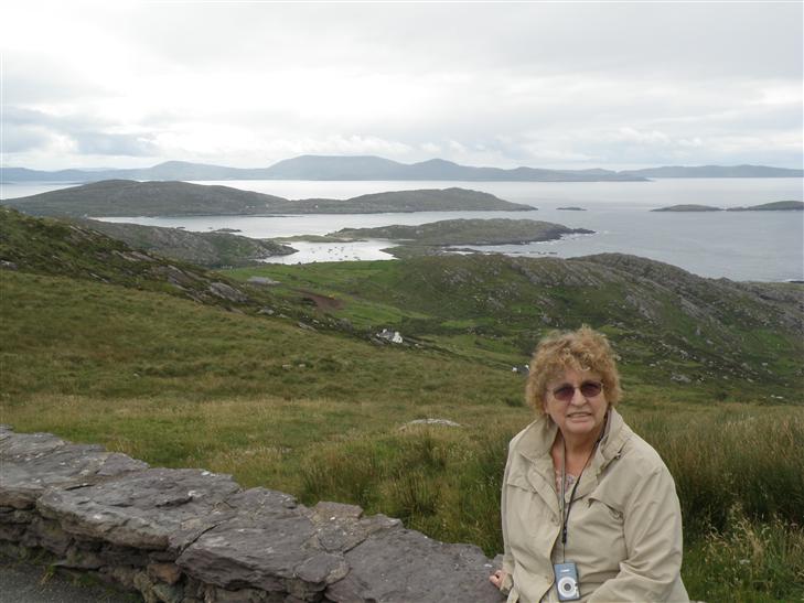 in combination with the gray sky and the beautiful landscape, islands and water make this a dramatic shot.