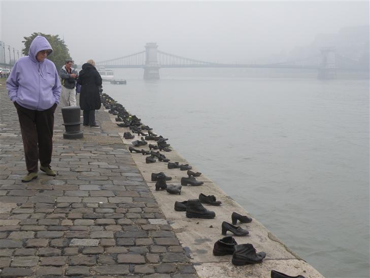 On the edge of the Danube, in 1944, Jewish people were executed, to fall into the river and drift away.