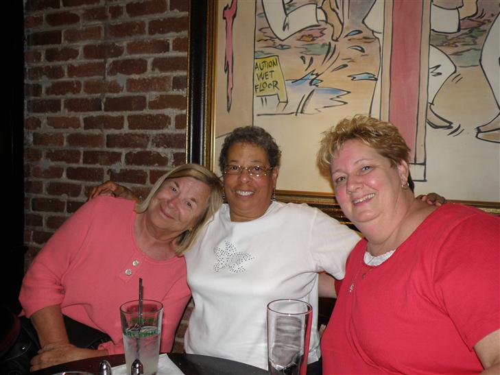 looking happy at the bar, the night before the party.