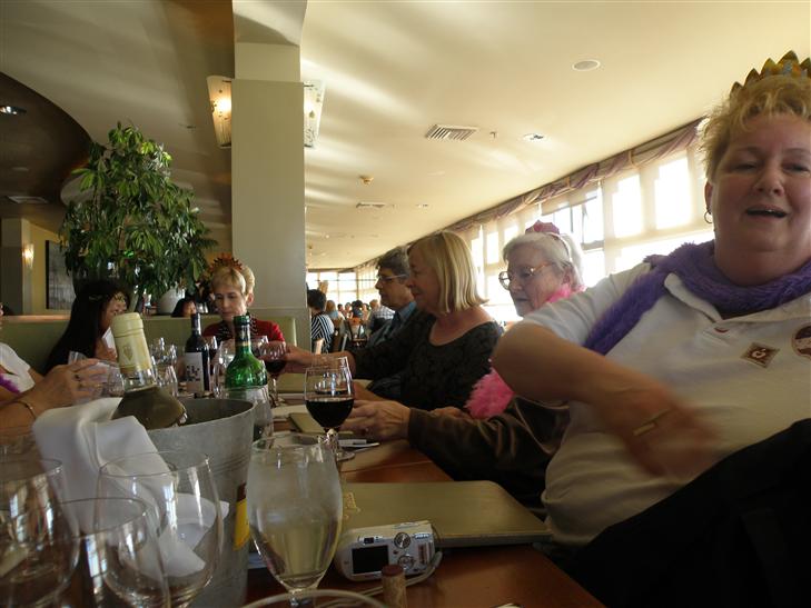 R-L Linda, Dorthea, Jane, Rob, Kathy, and shosho peeking out from behind the wine bottle.