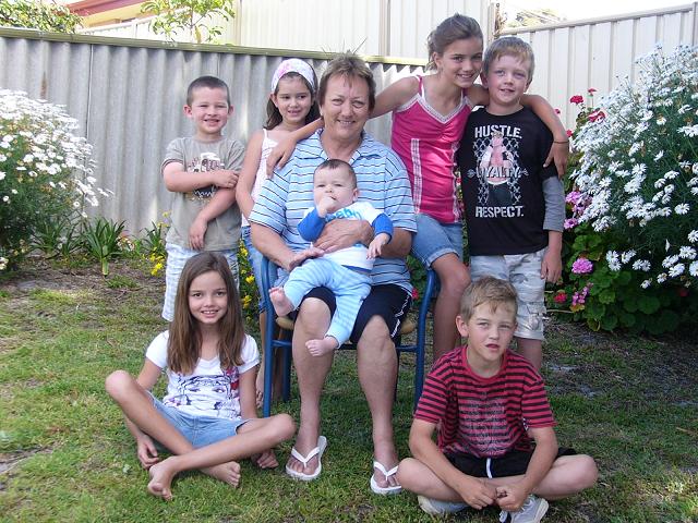 Me and my seven grandchildren.
Not exactly dressed for photo sessions but it was the holiday season!