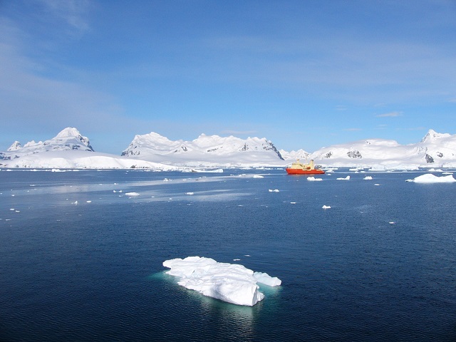 A small ship cruising by in the tranquil waters. We were extremely lucky with the weather while we were there.