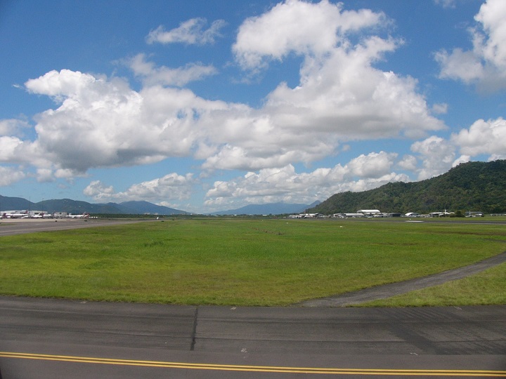 Taken from the plane along the runway as the plane is about to take-off at Cairns Airport