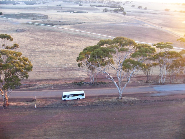 Looking down at the bus they use to transport us to where the balloon will take off. My son, his wife & her step-father were allowed to travel in it