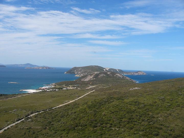 Coming in to land in the helicopter, looking over Whale World with King George Sound on the left and the Southern Ocean beyond the headland.