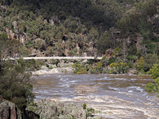 The Suspension Bridge across the South Esk.
This rocks as you walk across it.
The chairlift you can just see has a central span of 308 metres, which is believed to be the longest single chair lift span in the world