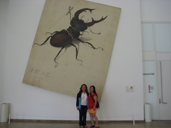 We're in the Getty auditorium lobby with the BIG BUG with a huge pin in it!