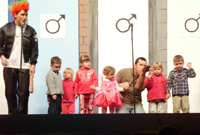 Laura on stage (2nd on the right) in the 'Gang Show'. A live performance by the Boy Scouts.