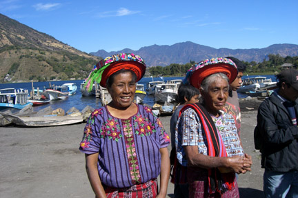 Two ladies in traditional head wrap.